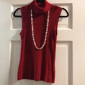 Red sleeveless turtleneck tank